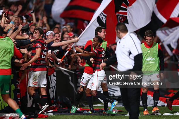 Wanderers Tomi Juric jumps into the RBB to rescue Youssouf Hersi after he scored the first goal against the Mariners at Parramatta Stadium. Sydney,...