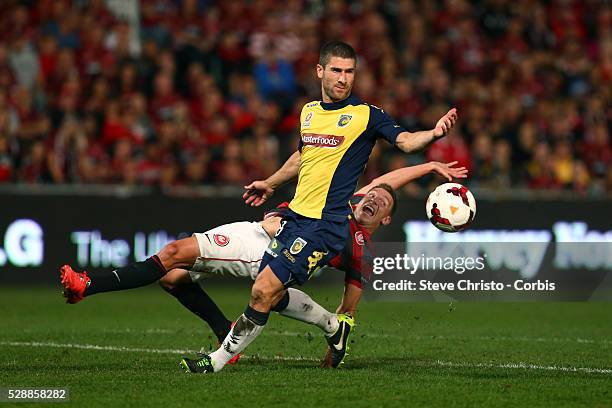 Wanderers Brendon Santalab looks for a penalty in this challenge by Mariners Nick Montgomery at Parramatta Stadium. Sydney, Australia. Saturday 26th...