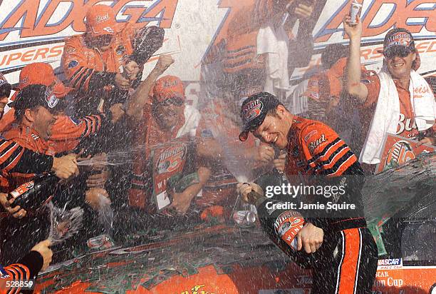 Dale Earnhardt Jr. Celebrates with his team in Victory Lane after winning Sunday's EA Sports 500 at Talladega Superspeedway in Talladega, Alabama....