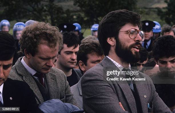 Sinn Fein leader Gerry Adams and Sinn Fein deputy leader and alleged IRA chief of staff, Martin McGuinness attend the funeral of an IRA volunteer, as...