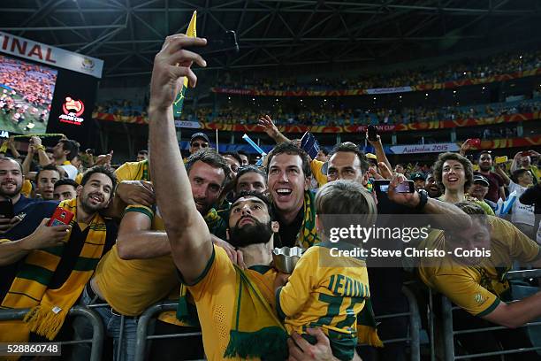 Australia's captain Mile Jedinak takes a selfie during the lap of honour after beating Korea Republic 2-1 at Stadium Australia. Sydney Australia....