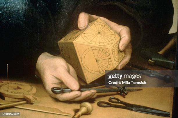 The clockmaker Nicolas Kratzer. Detail of a painting by Hans Holbein, dated 1528, at the Louvre, Paris. Color.