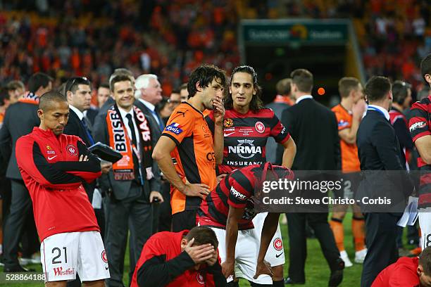 Brisbane Roar's Thomas Broich talks to Wanderers Jerome Polenz after the match at Suncorp Stadium. Brisbane, Australia. Sunday 4th May 2014.