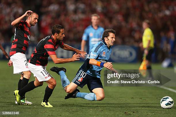 Sydney Derby - Sydney FC v Western Sydney Wanderers FC at Parramatta Stadium. Sydney's Alessandro Del Piero gets tackled by Wanderers Tarek Elrich...