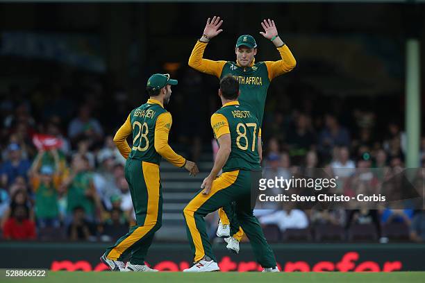South Africa's Kyle Abbott celebrates the wicket of Marlon Samuels of the West Indies at the Sydney Cricket Ground. Sydney, Australia. Friday, 27th...