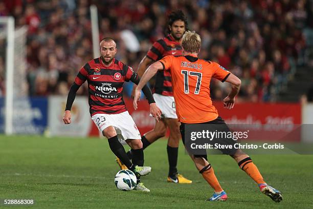 League semi final Western Sydney Wanderers FC v Brisbane Roar FC at Parramatta Stadium. Wanderers Jason Trifiro takes on Roar's Mitchell Nichols....