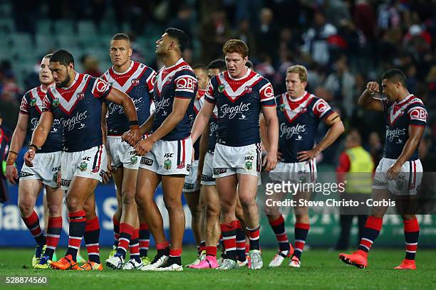 The Roosters walk off after being beaten by the Storm during the Qualifying Final match between Sydney Roosters and Melbourne Storm at Allianz...
