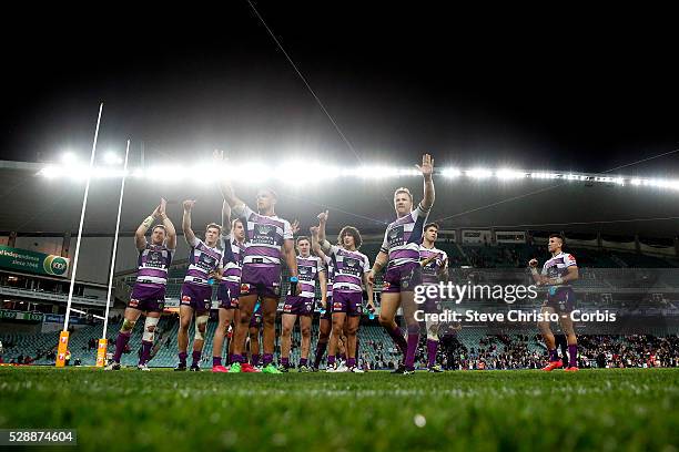 The Storm thank loyal fans after defeating the Roosters during the Qualifying Final match between Sydney Roosters and Melbourne Storm at Allianz...