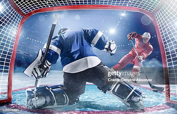 ice hockey players in action - ice hockey player stock pictures, royalty-free photos & images