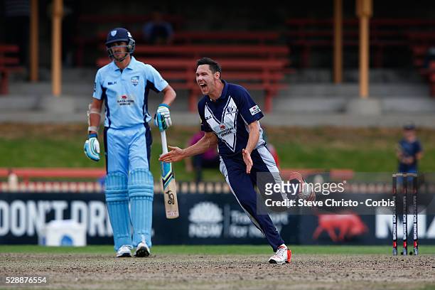 Scott Boland of the Bushrangers celebrates taking the wicket of Nathan Lyon and winning the match against the Blues in the Matador BBQ's One-Day Cup...