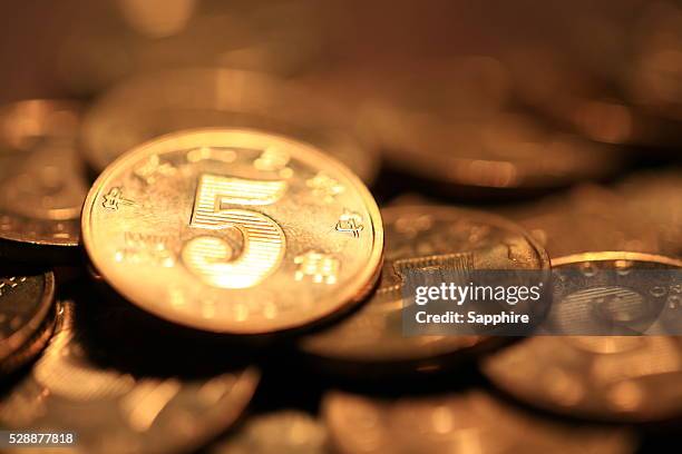 stack of chinese currency - gold abacus stock pictures, royalty-free photos & images