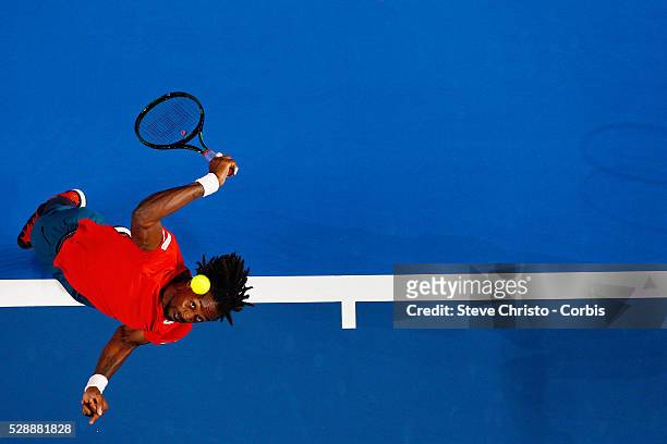 The World's Gael Monfils serves during his match against Nick Kyrgios of Australia during the Fast 4 tennis tournament at Allophones Arena. Sydney,...