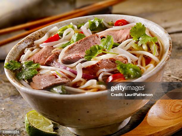 beef pho - pho stock pictures, royalty-free photos & images