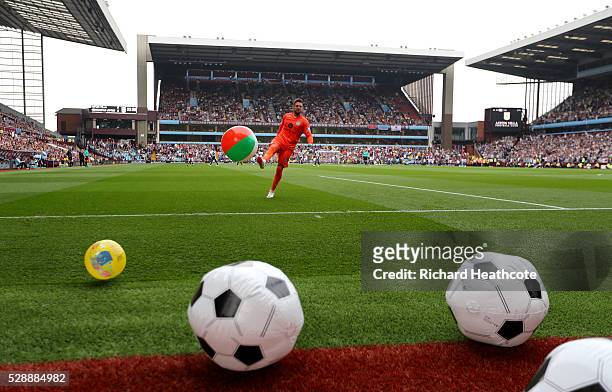 Mark Bunn of Aston Villa clears the ball prior to the Barclays Premier League match between Aston Villa and Newcastle United at Villa Park on May 7,...