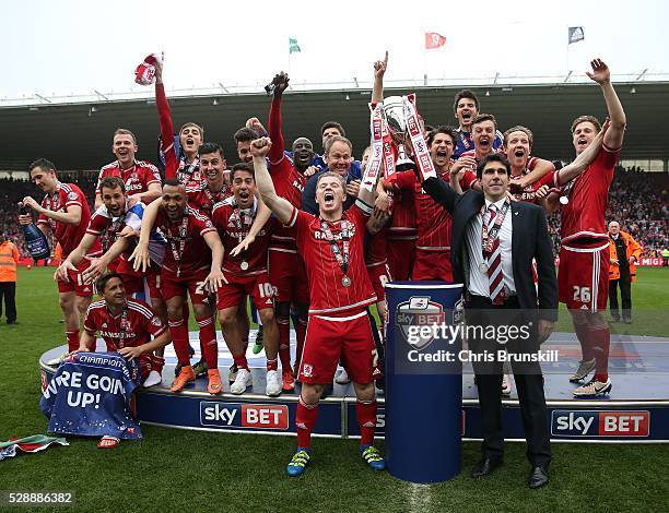 Middlesbrough manager Aitor Karanka and captain Grant Leadbitter lift the trophy following the Sky Bet Championship match between Middlesbrough and...