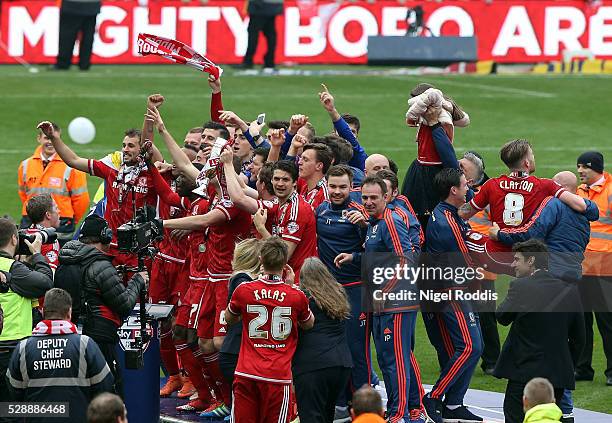 Middlesbrough players celebrate promotion after the Sky Bet Championship match between Middlesbrough and Brighton and Hove Albion at the Riverside...