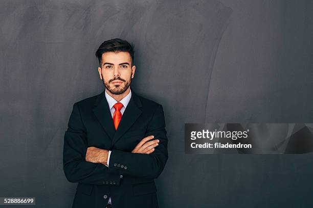 businessman front of blackboard - school tie stock pictures, royalty-free photos & images