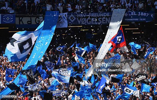 Fans of Hamburg show their support during the Bundesliga match between Hamburger SV and VfL Wolfsburg at the Volkspark stadium on May 07, 2016 in...