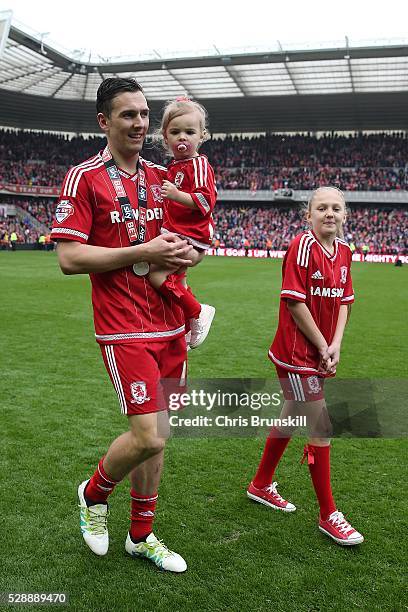 Stewart Downing of Middlesbrough takes part in a lap of honour with his daughters following the Sky Bet Championship match between Middlesbrough and...
