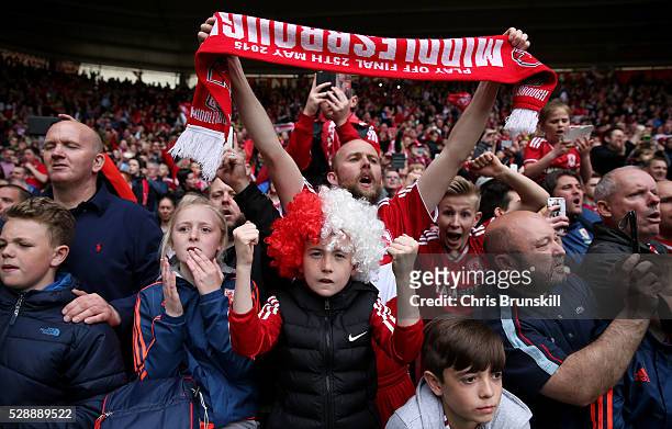Middlesbrough supporters celebrate their team's promotion after the Sky Bet Championship match between Middlesbrough and Brighton and Hove Albion at...