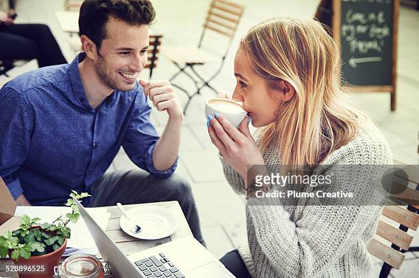 couple working in cafe - female with friend in coffee stock pictures, royalty-free photos & images
