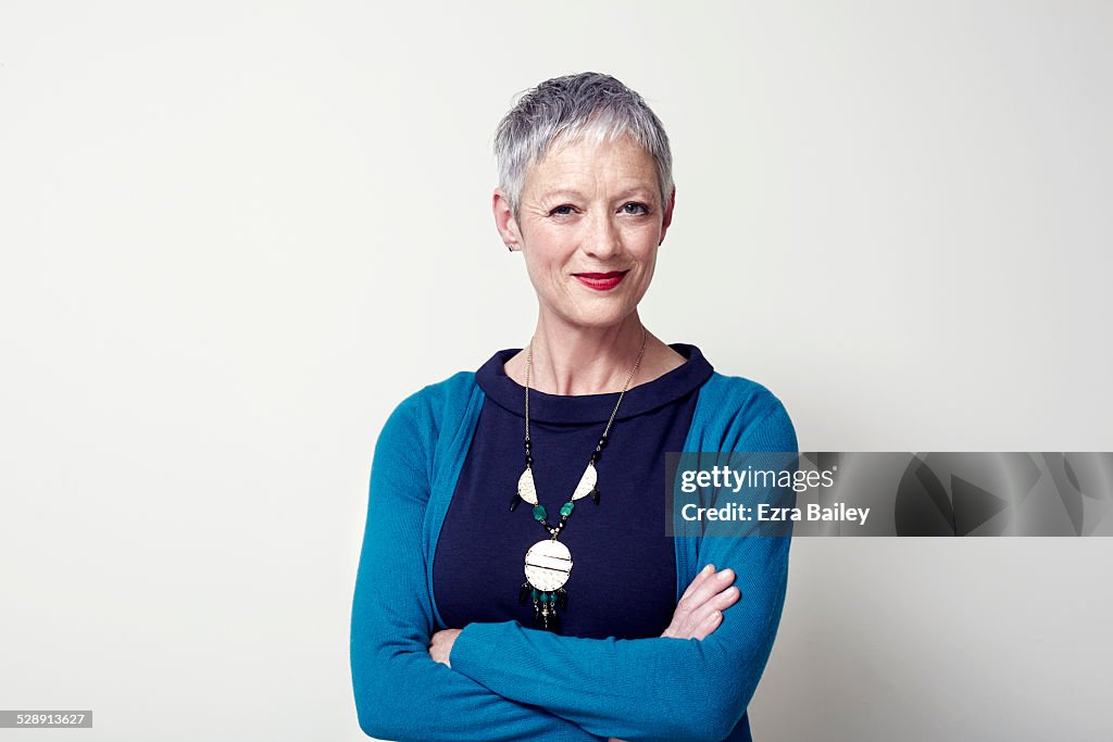 Portrait of a business woman arms folded.