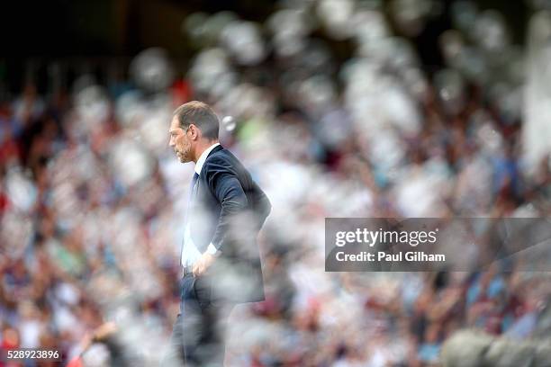 Manager Slaven Bilic of West Ham United looks on from the touchline during the Barclays Premier League match between West Ham United and Swansea City...