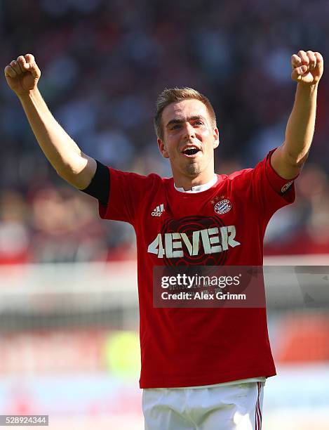 Philipp Lahm of Bayern Muenchen celebrates the Bundesliga champions after beating Ingolstadt 2-1 in the Bundesliga match between FC Ingolstadt and FC...