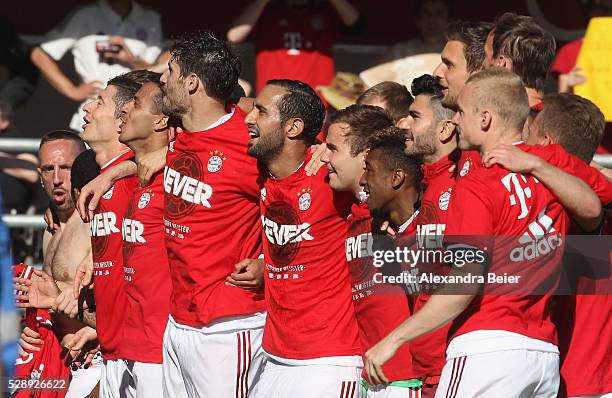 Players of Bayern Muenchen celebrate their German Championship title after the Bundesliga match between FC Bayern Muenchen and FC Ingolstadt at Audi...