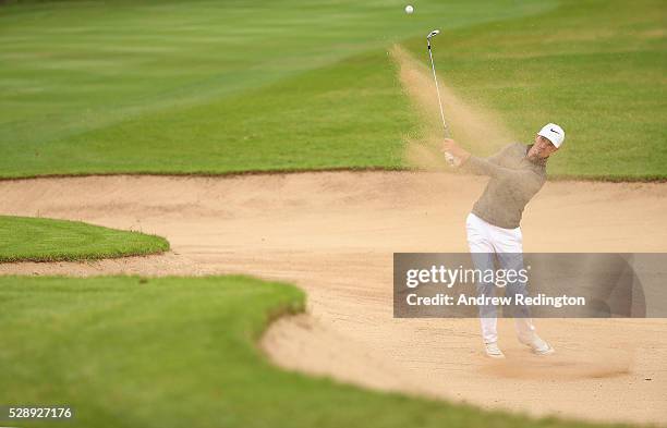 Paul Peterson of the USA plays a bunker shot on the first hole during the third round of the Trophee Hassan II at Royal Golf Dar Es Salam on May 7,...