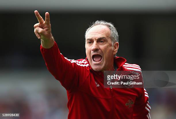 Manager Francesco Guidolin of Swansea reacts from the touchline during the Barclays Premier League match between West Ham United and Swansea City at...