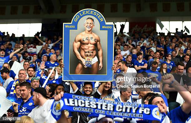 Leicester fans hold a poster displaying the image of former Leicester footballer Gary Lineker in his underwear, in relation to the TV presenter's...