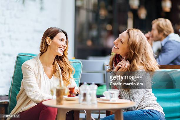 girls having coffee break - girlfriend stock pictures, royalty-free photos & images