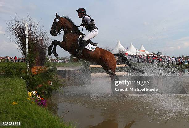 Joseph Murphy of Ireland riding Sportsfield Othello clears the lake fence during the cross-country test on day four of the Badminton Horse Trials on...