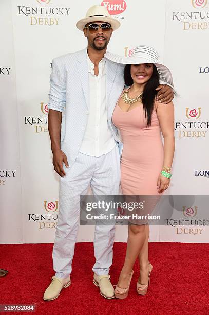 Basketball player Ramon Sessions and guest attend the 142nd Kentucky Derby at Churchill Downs on May 07, 2016 in Louisville, Kentucky.