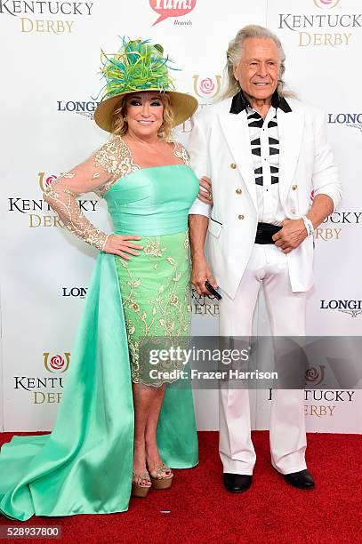 Musician Tanya Tucker and executive Peter Nygard attend the 142nd Kentucky Derby at Churchill Downs on May 07, 2016 in Louisville, Kentucky.