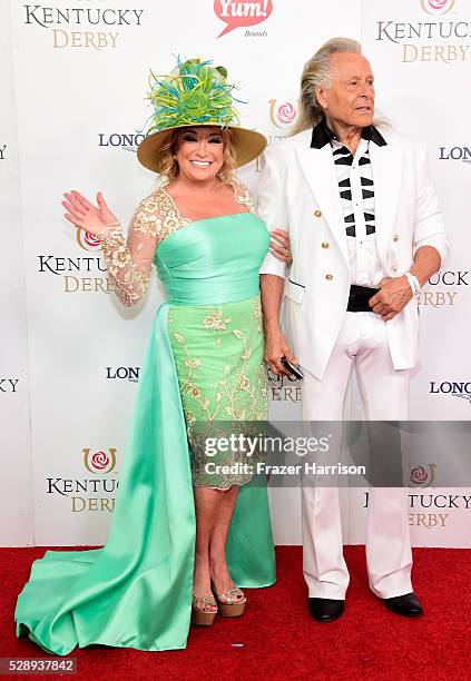 Musician Tanya Tucker and executive Peter Nygard attend the 142nd Kentucky Derby at Churchill Downs on May 07, 2016 in Louisville, Kentucky.