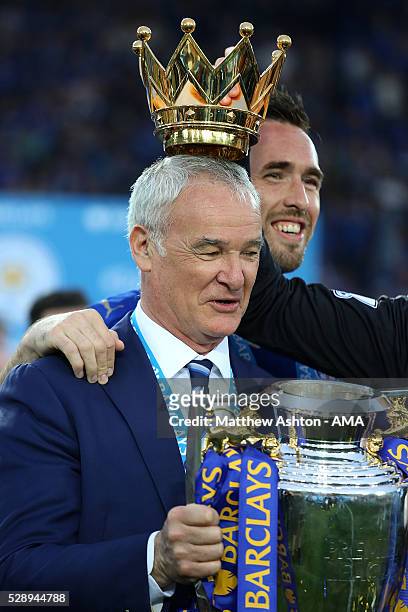 Manager/Head Coach of Leicester City Claudio Ranieri holds the Premier League Trophy as Leicester City celebrate becoming Premier League Champions...
