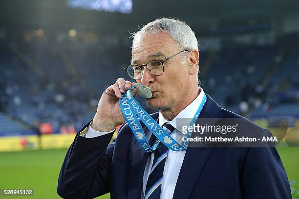 Manager/Head Coach of Leicester City Claudio Ranieri kisses his Premier League Winners medal as Leicester City celebrate becoming Premier League...