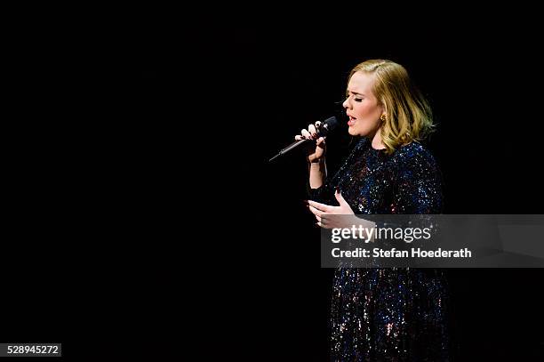 Singer Adele performs live on stage during a concert at Mercedes-Benz Arena on May 07, 2016 in Berlin, Germany.