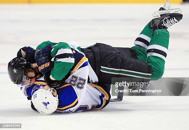 Kevin Shattenkirk of the St. Louis Blues and Vernon Fiddler of the Dallas Stars fight in the third period in Game Five of the Western Conference...
