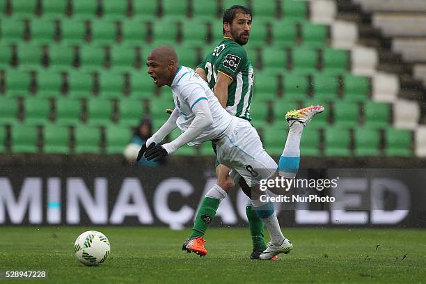 Porto's Algerian forward Yacine Brahimi faces Rio Ave's player Pedrinho and asks for penalty during the Premier League match between Rio Ave and FC...