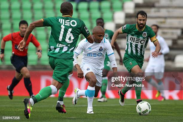 Porto's Algerian forward Yacine Brahimi faces Rio Ave's player Edimar and Rio Ave's player Marcelo during the Premier League match between Rio Ave...