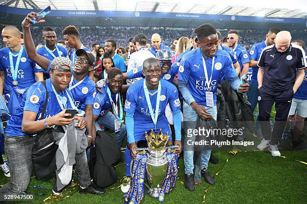 Golo Kante of Leicester City celebrates with the Premier League trophy at the King Power Stadium on May 7th , 2016 in Leicester, United Kingdom.