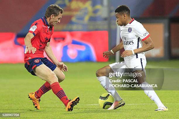 Paris Saint-Germain's Christopher Nkunku vies with Ajaccio's French defender David Ducourtioux during the L1 football match Gazelec Ajaccio against...