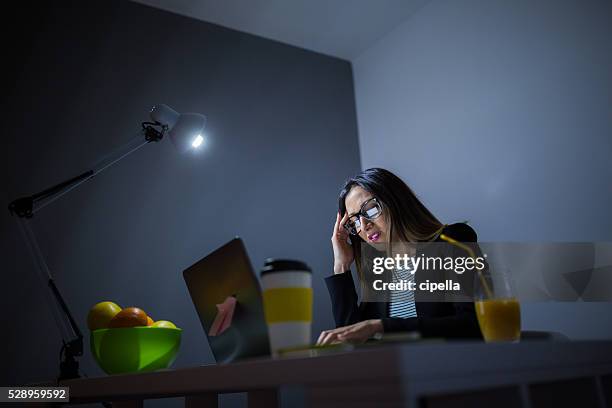 migraines at work - grumpy boss stock pictures, royalty-free photos & images