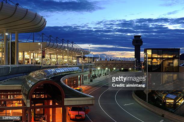 ted stevens anchorage international airport at night - anchorage airport stock pictures, royalty-free photos & images