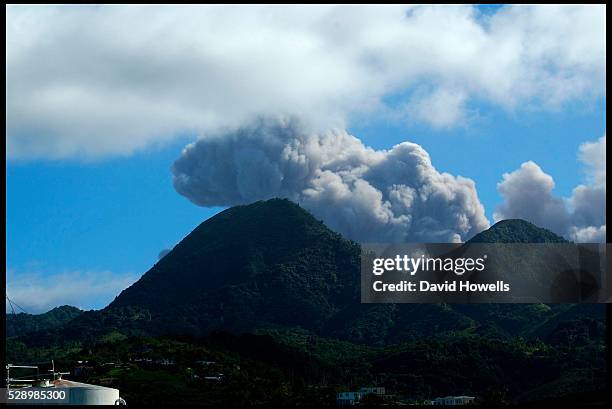 Column of steam and ash billow from the Soufriere Hills volcano during an eruption on Montserrat.