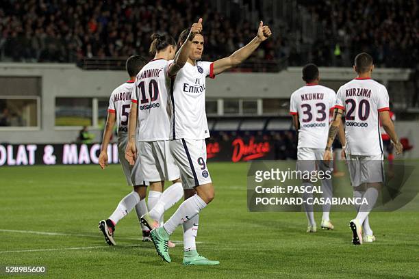 Paris Saint-Germain's Uruguayan forward Edinson Cavani celebrates after scoring a goal during the L1 football match Gazelec Ajaccio against Paris...