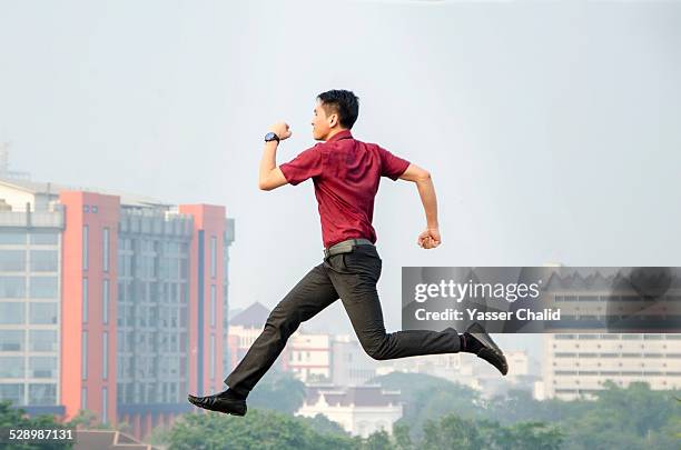 running on air - short sleeved stock pictures, royalty-free photos & images